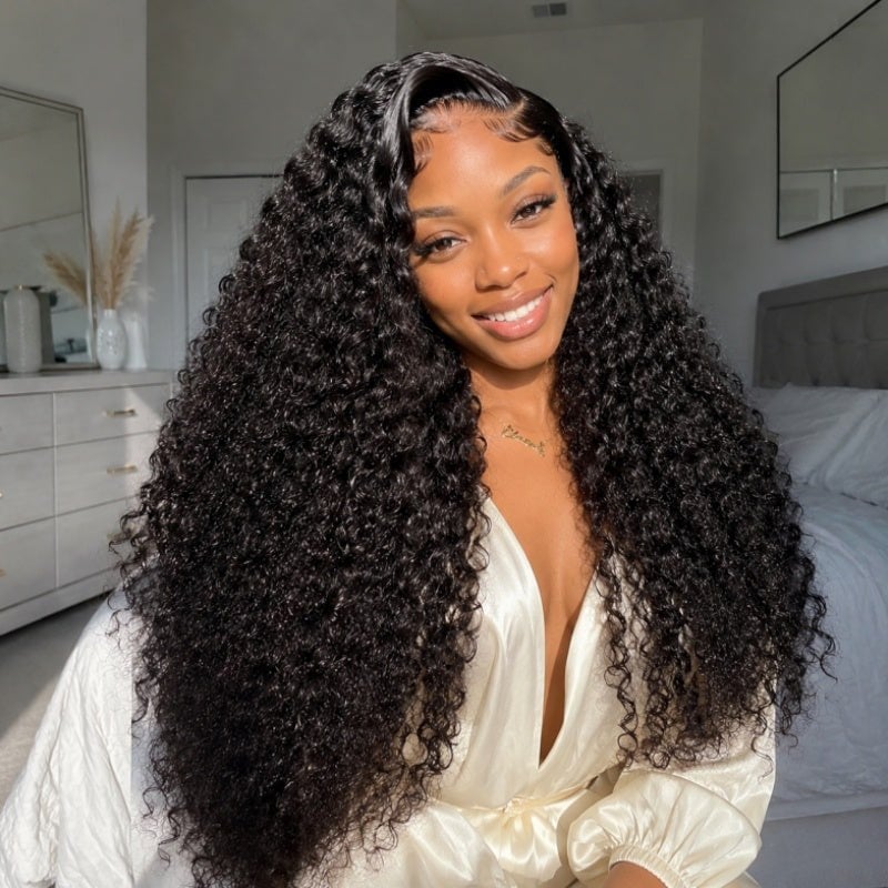 Model wearing a long, voluminous natural black deep curly Amanda Hair glueless lace front wig