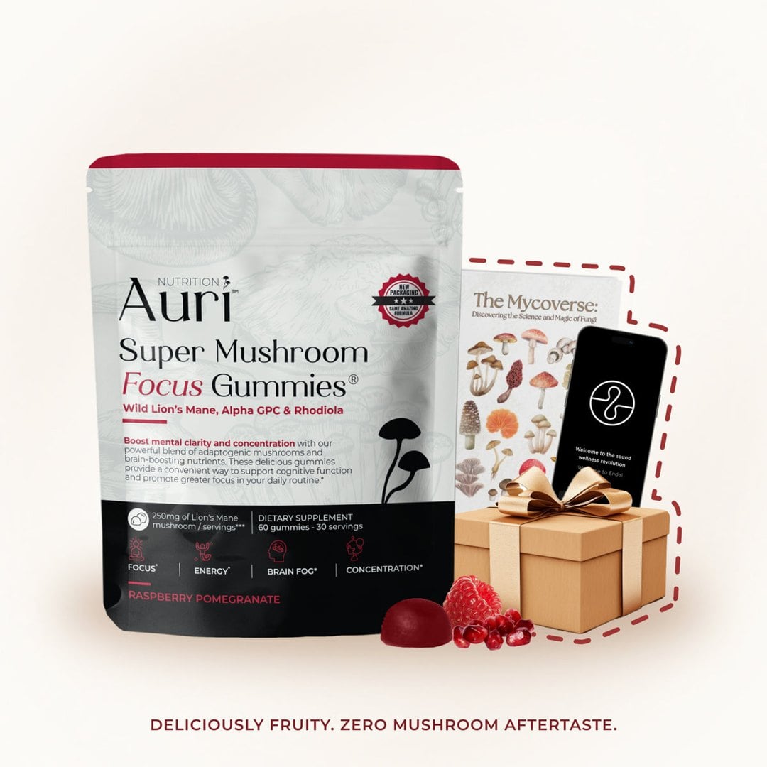 Auri Super Mushroom Focus Gummies pouch with red berry gummies beside a gift box