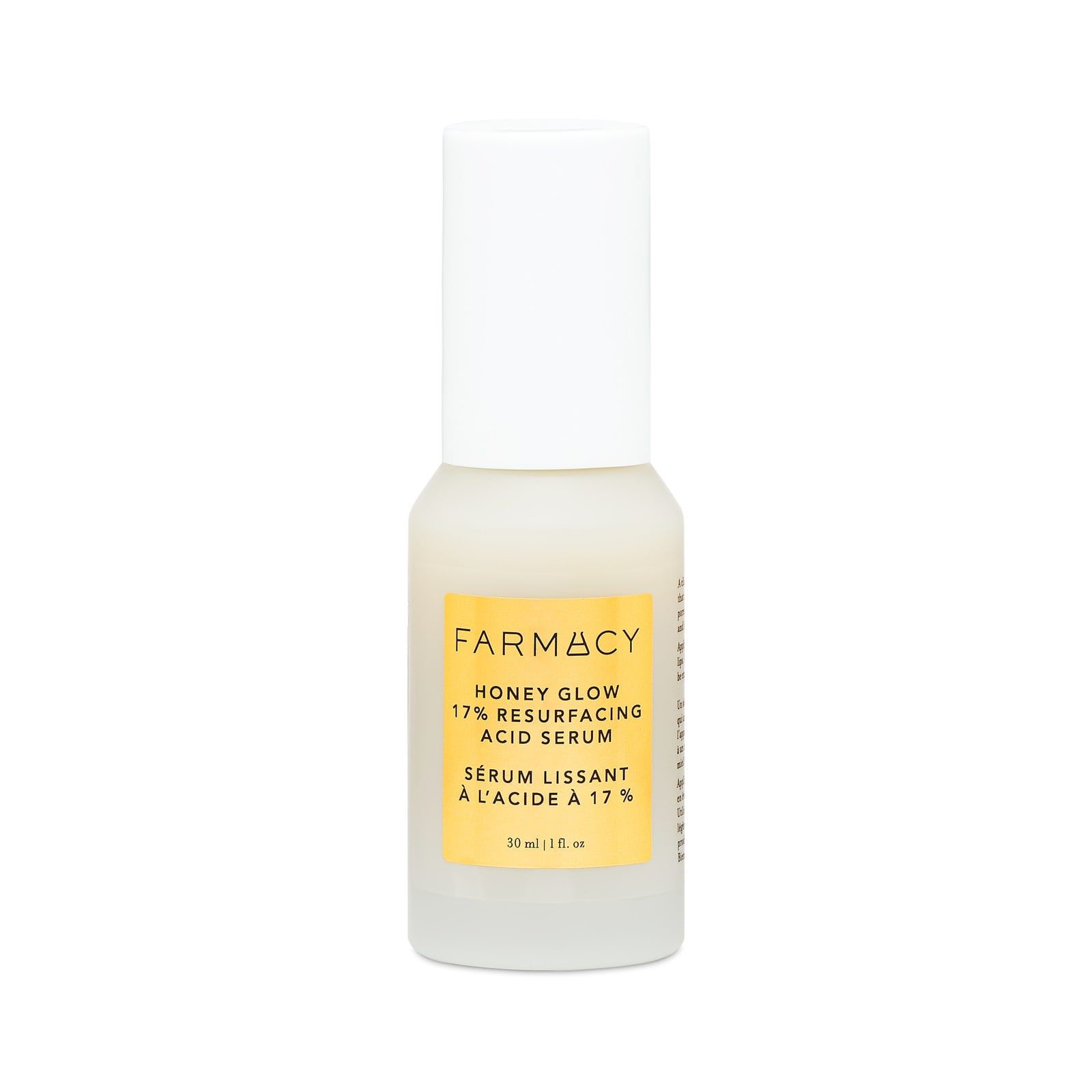 Farmacy Honey Glow 17% Resurfacing Acid Serum in a frosted 30 ml pump bottle with a white cap and honey-yellow label