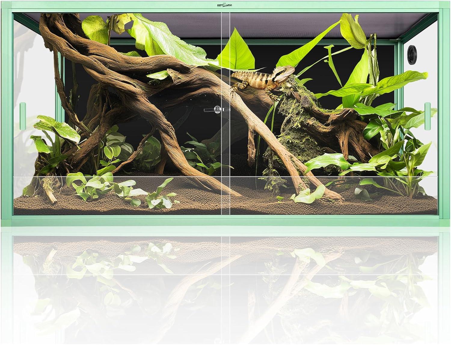 REPTI ZOO stackable aluminium reptile terrarium in mint green with sliding tempered glass doors, a mesh top and a lizard on driftwood among plants
