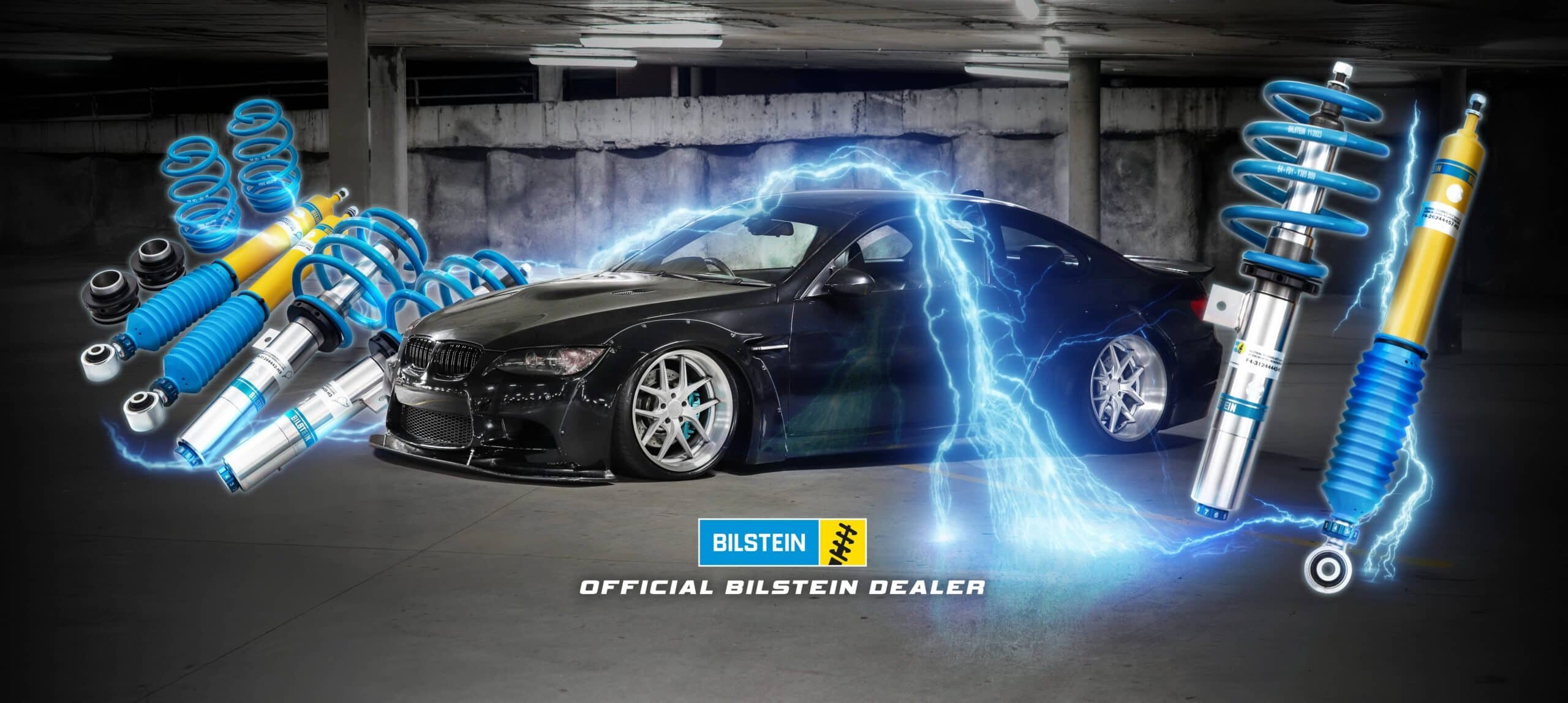 Black BMW with suspension components including coilovers, shock absorbers, and springs with lightning effects